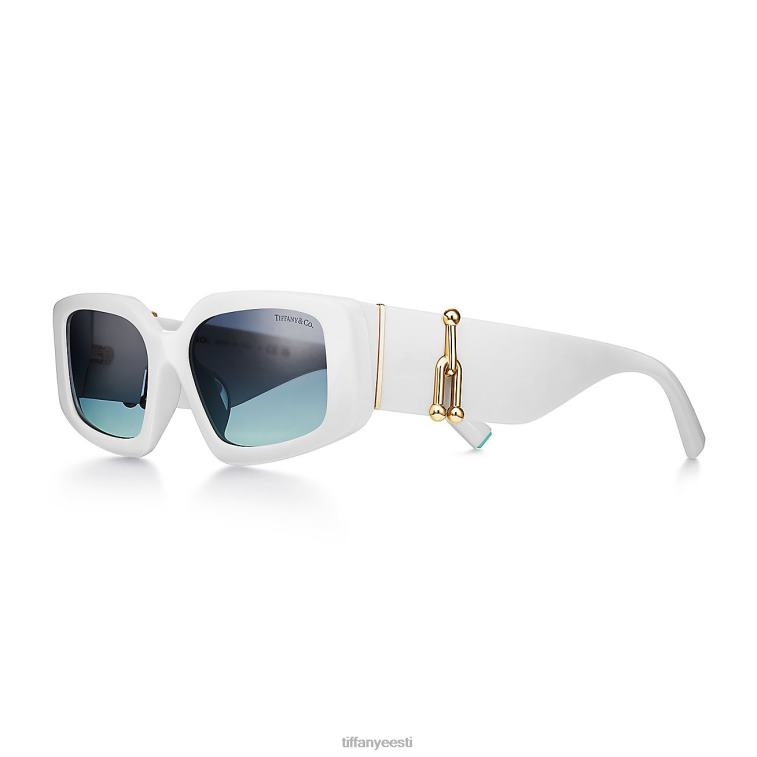 valges atsetaadis koos taevasinise gradiendiga läätsedega