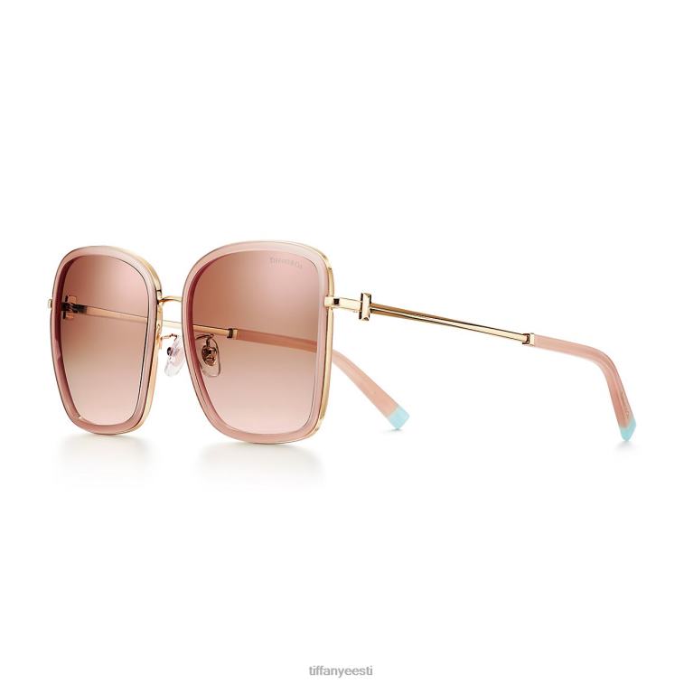 opaalakt, kahvatukollasel metallil roosade läätsedega