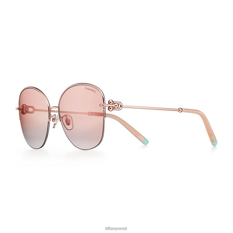 roosa kullavärvi metallist roosade klaasidega